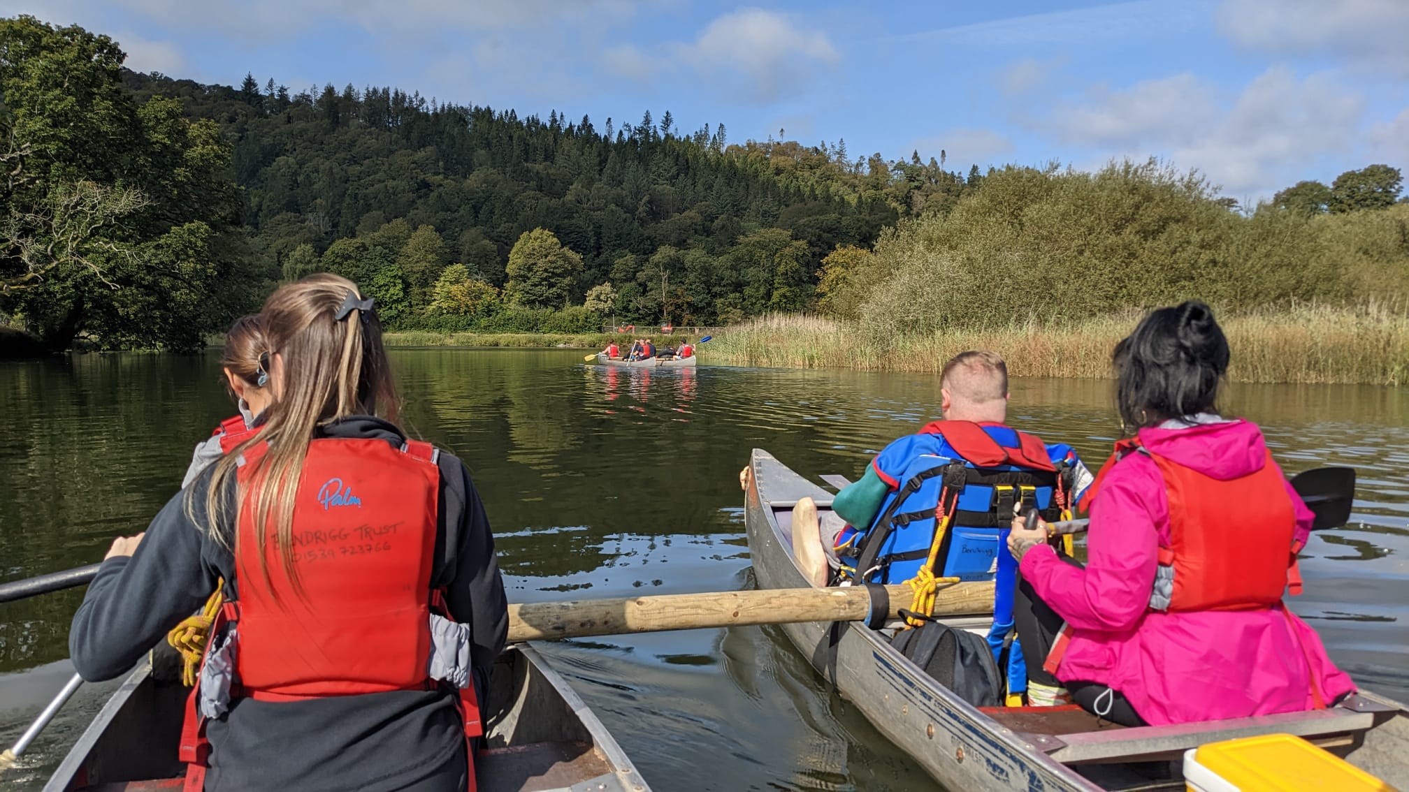 Canoeing in 2 canoes fixed together at Bendrigg Trust